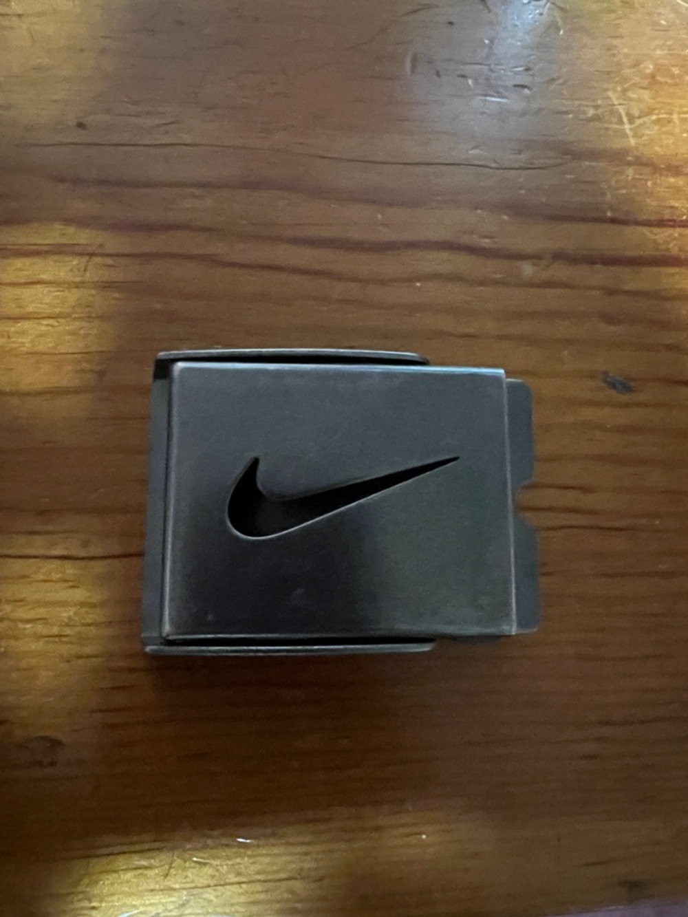 Nike Metal Belt Buckle in Dark Gray with Black Swoosh
